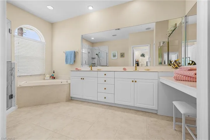 Soaking tub, separate updated shower.