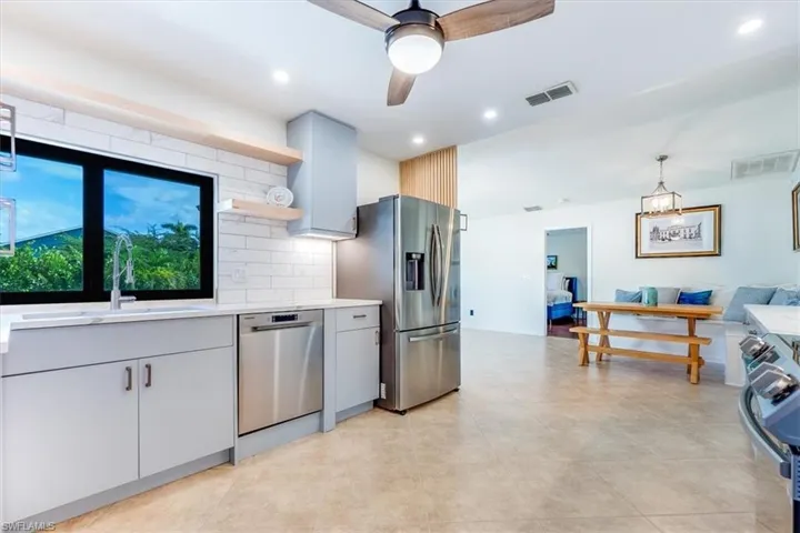 Kitchen window overlooking pool area