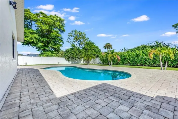 Beautifully landscaped yard with lush greenery