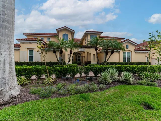 Mediterranean / spanish-style house featuring a front lawn