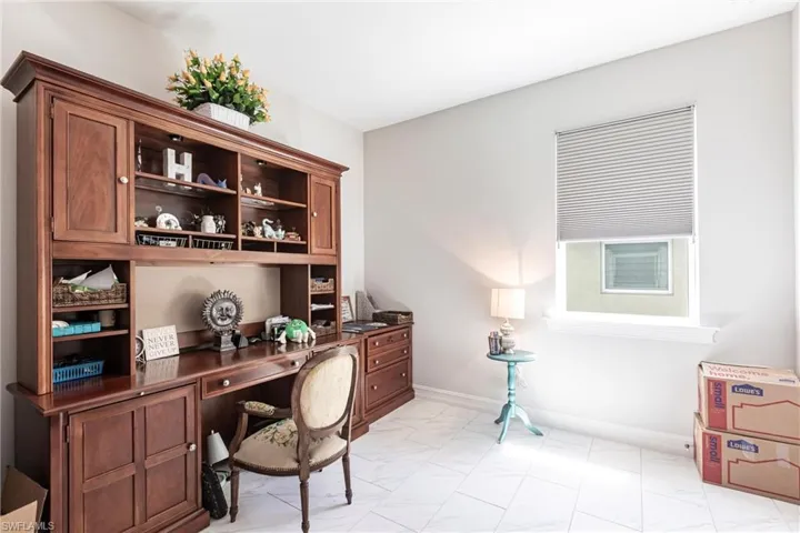 Flex Space or Bedroom # 3 ~ Rectangular Tile Floors ~ Custom Blinds ~ There is a closet in the room