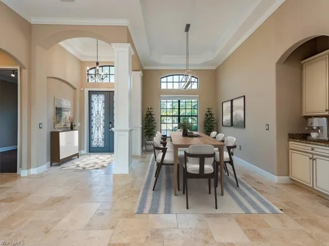 Beautiful entry and dining space - This photo has been staged virtually