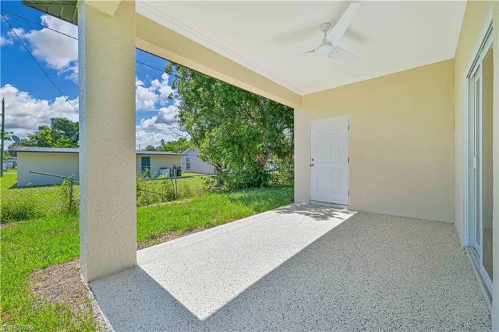 View of patio with ceiling fan