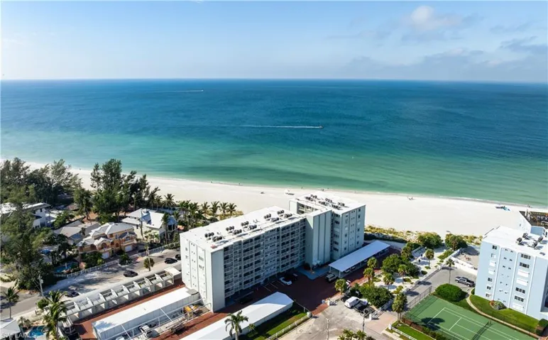 Bird's eye view of waterfront with a beach