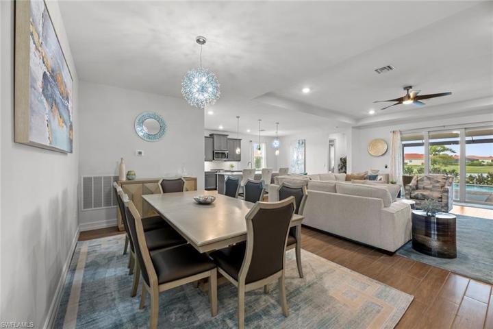 Dining area has the WOOD-LOOK TILE and new chandelier (November 2022).