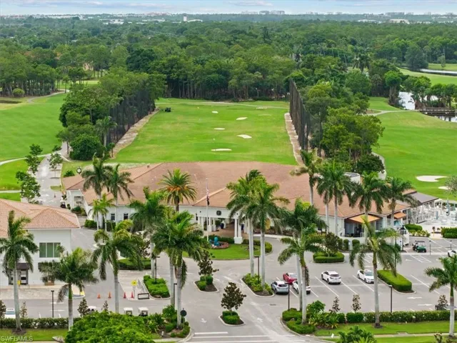 Aerial view of a golf club and a nearby body of water