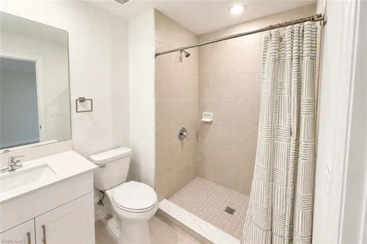 Bathroom with tub and shower.