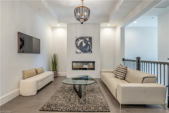 Media room with electric fire place or  office, den space