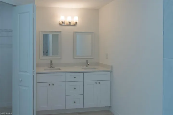 Bathroom featuring dual vanity