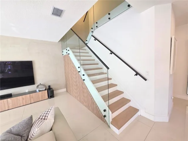 Stairway with tile patterned flooring