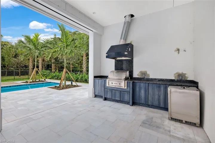 Outdoor kitchen with natural gas grill