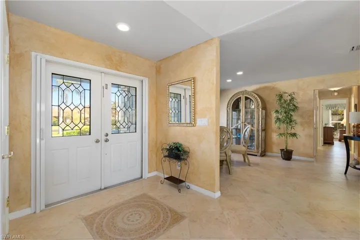 Foyer featuring a healthy amount of sunlight