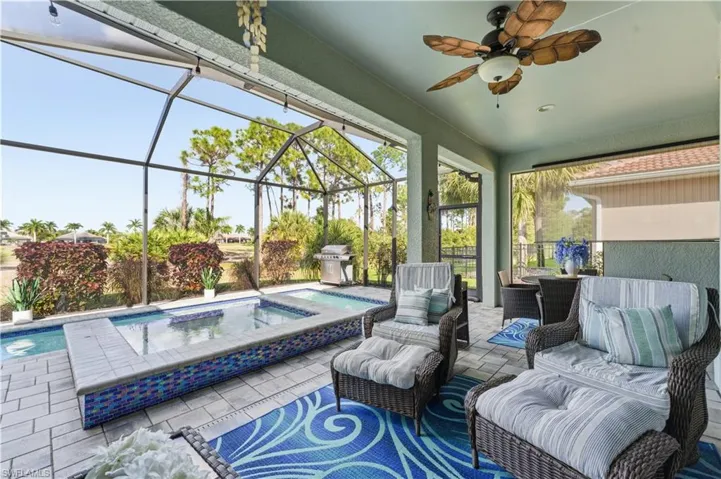 Outdoor covered lanai with entertainment area.