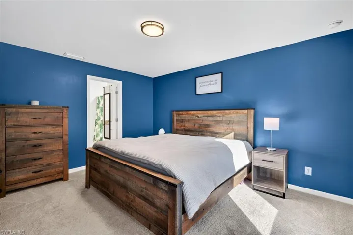 Bedroom featuring carpet