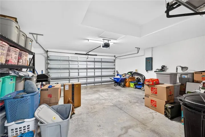 Garage featuring electric panel