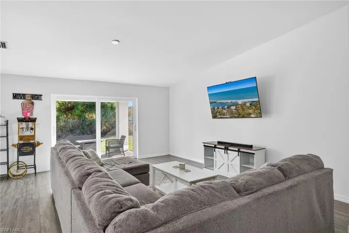 Living area featuring wood finished floors and baseboards