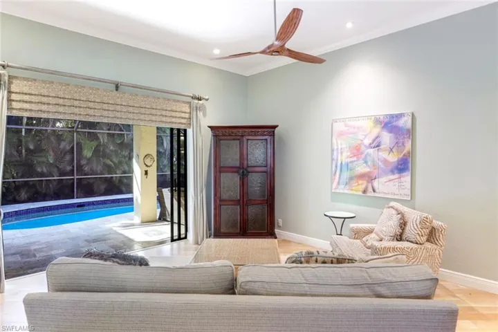Open to the screened lanai and pool