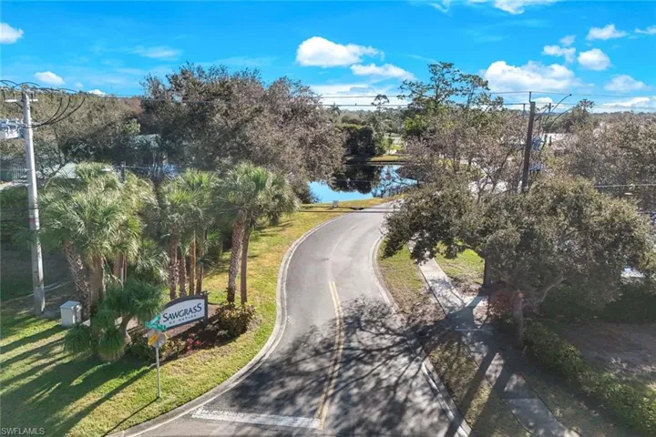 LOW HOA FEES in this idyllic North Naples neighborhood
