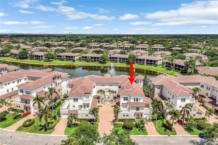 Aerial view of residential area with a nearby body of water