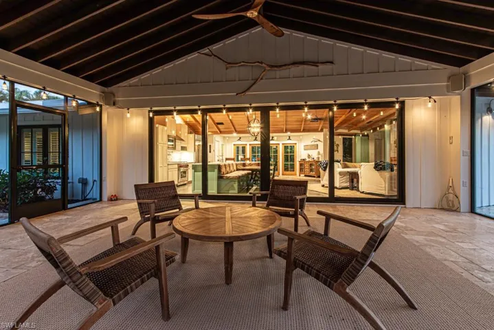 View of patio featuring a ceiling fan