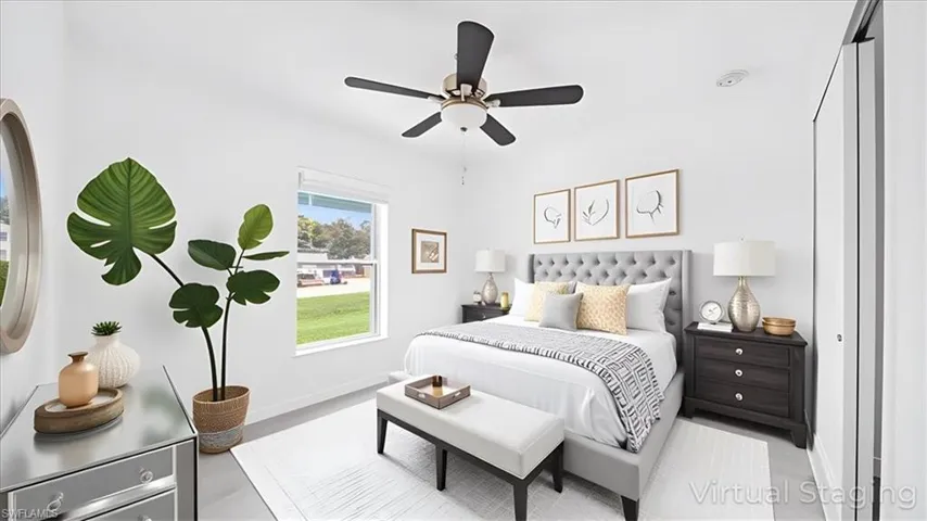 Bedroom featuring baseboards and a ceiling fan
