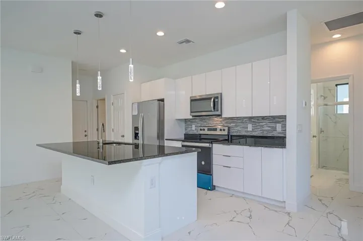 703  Washington  AVE, Lehigh Acres, FL 33972