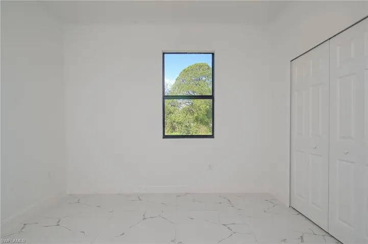 703  Washington  AVE, Lehigh Acres, FL 33972