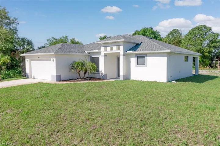 703  Washington  AVE, Lehigh Acres, FL 33972