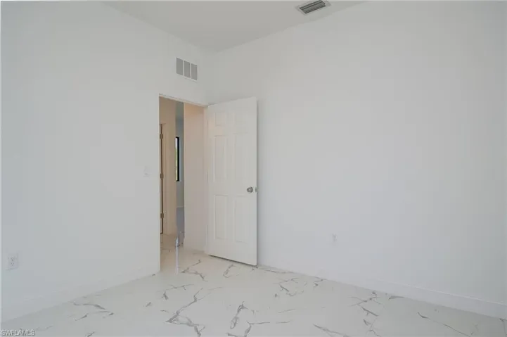 703  Washington  AVE, Lehigh Acres, FL 33972