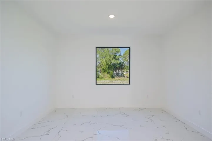 703  Washington  AVE, Lehigh Acres, FL 33972