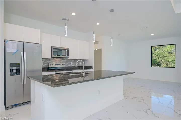 703  Washington  AVE, Lehigh Acres, FL 33972