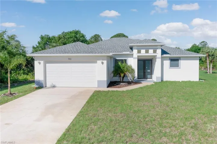 703  Washington  AVE, Lehigh Acres, FL 33972