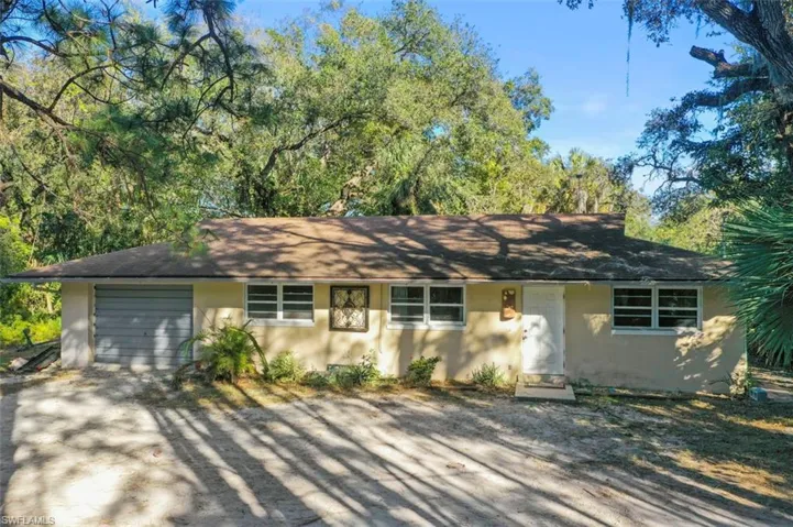 Ranch-style house with a garage