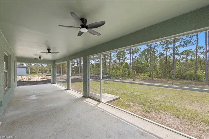 Oversized screened lanai with 3 ceiling fans