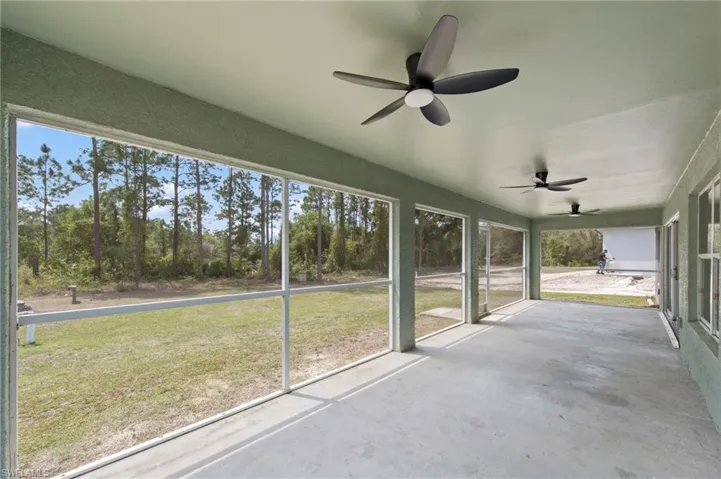 Oversized screened lanai with 3 ceiling fans