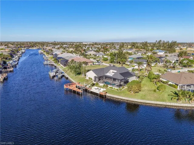 Aerial view of residential area with a nearby body of water