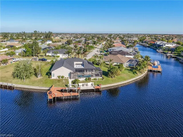 Aerial view of residential area with a large body of water