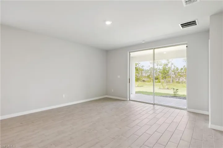 Spare room featuring light hardwood / wood-style flooring