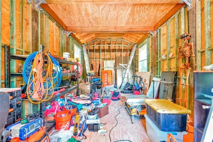 Miscellaneous room with vaulted ceiling