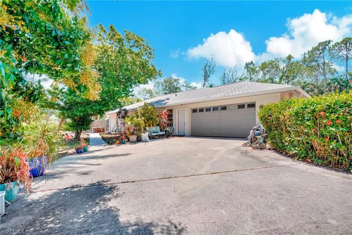 Ranch-style home with a garage