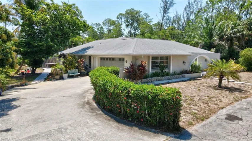 Single story home with a garage