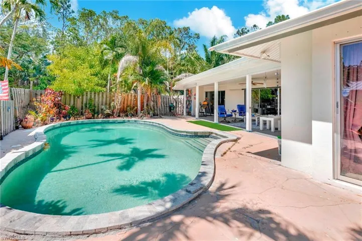 View of swimming pool with a patio area