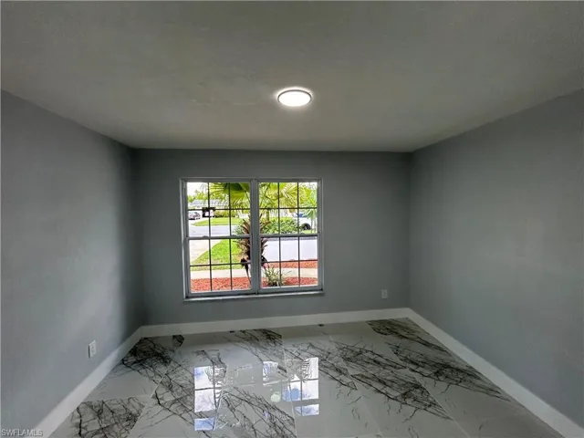 View of tiled empty room