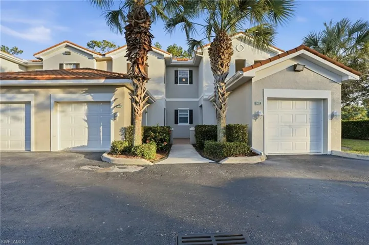 Mediterranean / spanish-style home with stucco siding and a tiled roof