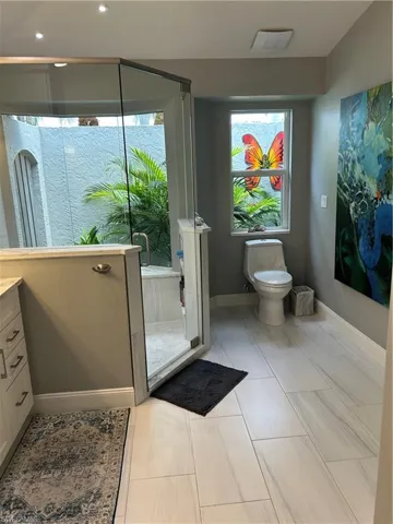 Calming, tropical views in your spacious en-suite bathroom