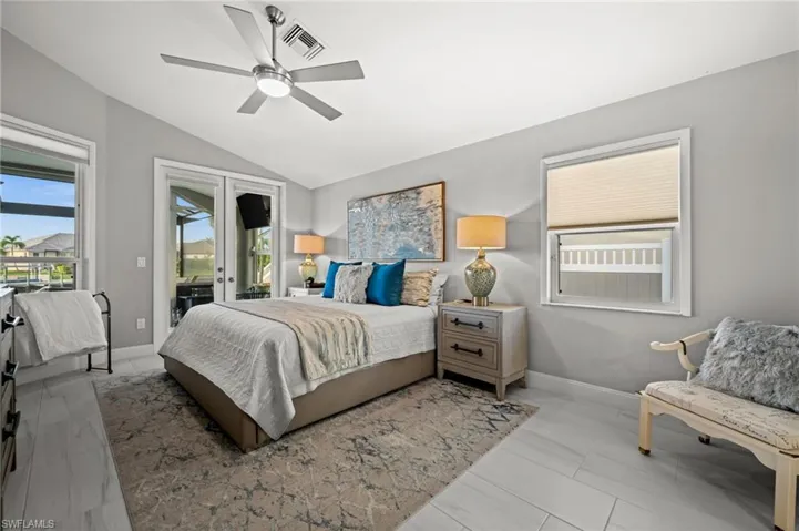 Oversized primary bedroom with plenty of natural light