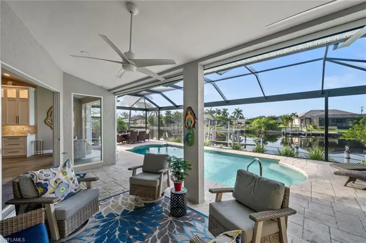 Relax poolside while enjoying the beautiful waterfront views