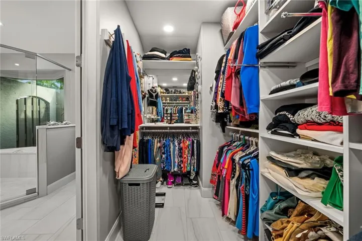 Large primary closet with jewelry nook