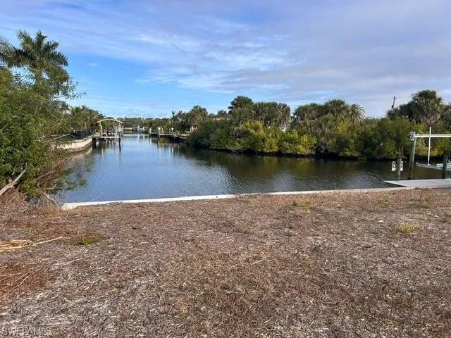 Water view featuring a boat dock