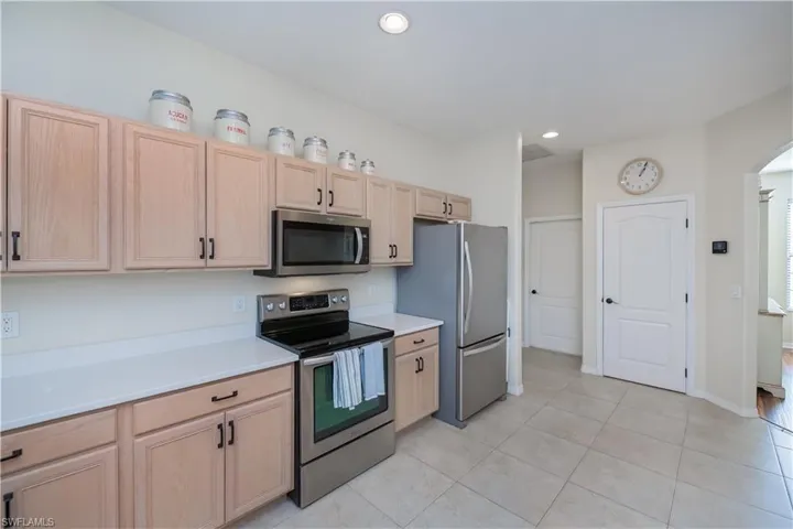 kitchen looking towards the pantry and entry to garage